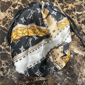 Upscale Fashion from a Boutique Black and Gold look a like Monogram Pouch